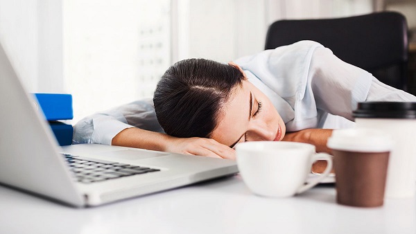 Woman experiencing daytime fatigue.