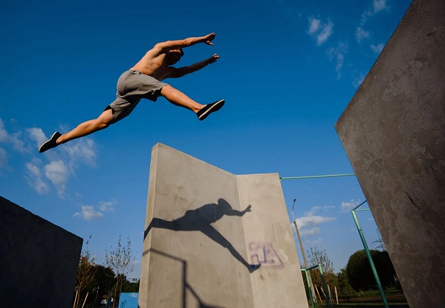 Person jumping in the air before losing mobility from Myotonic Dystrophy
