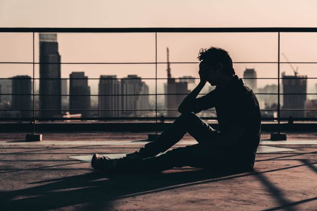 Person living with Myotonic Dystrophy feeling guilt and isolation