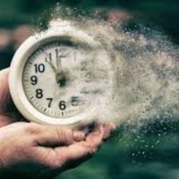 A clock disintegrates to show time passing at an incredible speed
